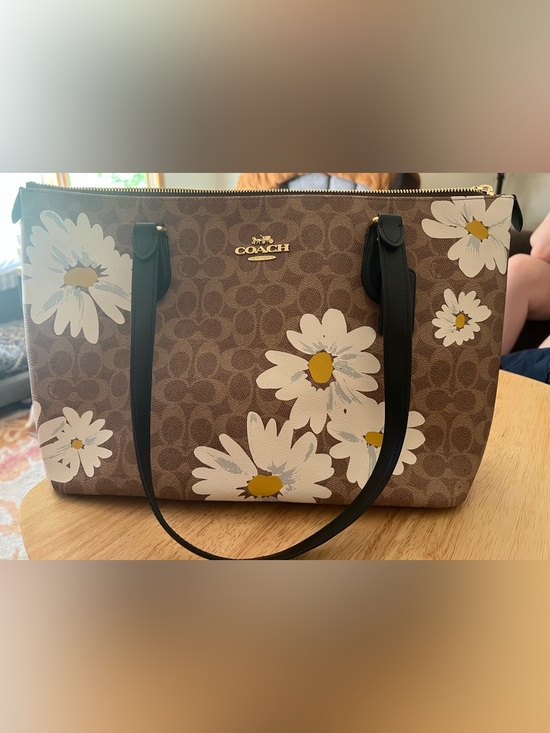 Coach Handbags - COACH Brown Daisy Print Tote with Black Handles and Gold Hardware